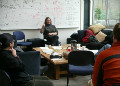 Professor Connie Rockosi defends a viewpoint vigorously at "Morning Science Coffee" - A daily discussion of astronomy events and research attended by professors, postdocs and grad students.